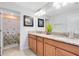 Bathroom featuring granite counters and a shower and tub combination at 1440 Pro Shop Ct, Davenport, FL 33896