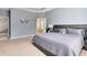 Spacious bedroom with carpet and a walk-in closet, perfect for relaxation at 1440 Pro Shop Ct, Davenport, FL 33896