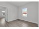 Neutral bedroom with base molding and natural light at 14889 Sw 46Th Ct, Ocala, FL 34473