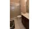 Clean bathroom with a glass door shower and tile flooring at 15313 Hayworth Dr, Winter Garden, FL 34787