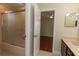 Bathroom featuring a shower with glass door and sink at 15313 Hayworth Dr, Winter Garden, FL 34787
