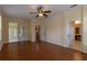 Bedroom featuring a ceiling fan and access to a bathroom at 15313 Hayworth Dr, Winter Garden, FL 34787