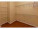 Walk-in closet provides plenty of storage space with its wall-to-wall shelving at 15313 Hayworth Dr, Winter Garden, FL 34787