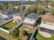 Aerial view of the home highlights the backyard, new roof, and community at 15318 Beamleigh Rd, Winter Garden, FL 34787