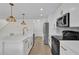 Kitchen with white cabinets and stainless steel appliances at 15318 Beamleigh Rd, Winter Garden, FL 34787