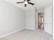 Cozy bedroom with soft carpet, a ceiling fan, and neutral walls creating a calming atmosphere at 1595 Juniper Hammock St, Winter Garden, FL 34787