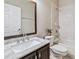 Updated bathroom featuring a shower-tub combo and modern vanity with granite countertop at 18468 Sabal St, Orlando, FL 32833