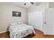 Bedroom features a spacious closet and unique decorative art on neutral walls at 18468 Sabal St, Orlando, FL 32833