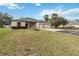 Lovely one-story home features a two-car garage, manicured lawn, and tasteful landscaping at 18468 Sabal St, Orlando, FL 32833