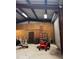 View of the large garage with work area and ample space for storage and projects at 18468 Sabal St, Orlando, FL 32833