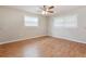 Bright and spacious bedroom with hardwood floors and ample natural light at 2021 Canal Rd, Deltona, FL 32738