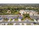 Panoramic aerial view of a residential neighborhood featuring a blue home with a large backyard and ample parking at 2067 Buckhanon Trl, Deland, FL 32720