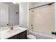 Bright bathroom with a shower-tub combination and a vanity with a white countertop, complete with tiled shower walls at 2067 Buckhanon Trl, Deland, FL 32720