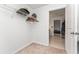 A bedroom closet featuring wire shelving and ample storage space at 2067 Buckhanon Trl, Deland, FL 32720