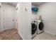 Modern laundry room with front-load washer and dryer units at 2067 Buckhanon Trl, Deland, FL 32720