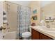 Well-maintained bathroom with a shower-tub combination, a toilet, and vanity at 221 Chippendale Ter, Oviedo, FL 32765