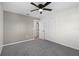 Empty bedroom features neutral walls, large windows, and a closet at 2751 Carmel Ct, Kissimmee, FL 34746