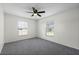 Empty bedroom with neutral walls and natural light from large windows at 2751 Carmel Ct, Kissimmee, FL 34746