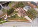 Beautiful aerial view of home with landscaped yard and view of pond with fountain in a well-kept neighborhood at 2753 Joseph Cir, Oviedo, FL 32765