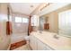 Bathroom with dual sinks, a shower-tub combo, and neutral finishes at 2753 Joseph Cir, Oviedo, FL 32765