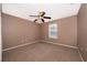 Neutral bedroom featuring carpet and a ceiling fan providing a calming ambiance at 2753 Joseph Cir, Oviedo, FL 32765