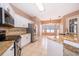 Beautiful kitchen featuring stone countertops, stainless steel appliances, and tiled backsplash at 2753 Joseph Cir, Oviedo, FL 32765