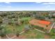 Enjoy the aerial views of the park with baseball field and palm trees for outdoor recreation at 2923 Cornell Ave, Orlando, FL 32804