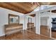 Bedroom with wood ceiling, wood floors, dresser and wardrobe with mirrored sliding doors at 2923 Cornell Ave, Orlando, FL 32804