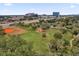 Scenic park view with a playground, baseball field, and the city skyline in the background at 2923 Cornell Ave, Orlando, FL 32804