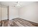 Bedroom with wood-look floors and a large closet at 330 Hickory Springs Ct, Debary, FL 32713