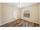 Neutral bedroom with natural lighting and a bathroom view at 330 Hickory Springs Ct, Debary, FL 32713