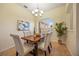 Cozy dining room with ample natural light and comfortable seating for four at 330 Hickory Springs Ct, Debary, FL 32713