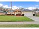 Charming single-story home with a well-manicured lawn and inviting curb appeal at 330 Hickory Springs Ct, Debary, FL 32713