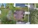 Aerial view of the property showcasing the roof, lot size, and surrounding neighborhood at 338 Silver Pine Dr, Lake Mary, FL 32746