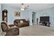 Relaxing living room with tiled floors and a comfortable seating area at 3504 Cayugas Loop, St Cloud, FL 34772