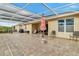 Enjoy this screened patio featuring brick pavers, an umbrella, and lots of space for outdoor entertaining at 3504 Cayugas Loop, St Cloud, FL 34772