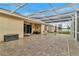 This screened patio has ample space and brick pavers, perfect for enjoying the outdoors at 3504 Cayugas Loop, St Cloud, FL 34772