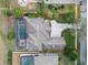 Aerial view showcases the layout of this property with a screened pool, spacious backyard, and well-maintained landscaping at 3569 Bellington Dr, Orlando, FL 32835