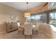 Breakfast nook featuring round table, four chairs, and a large window with a view of the backyard at 3569 Bellington Dr, Orlando, FL 32835