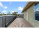 An outdoor deck area with a view of the community and access doors to the house at 3569 Bellington Dr, Orlando, FL 32835