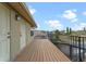 Spacious deck with beautiful view and black metal safety railing at 3569 Bellington Dr, Orlando, FL 32835