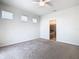 Bedroom featuring carpet flooring, ceiling fan, and ensuite bathroom at 3751 Lana Ave, Davenport, FL 33897