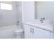 Bright bathroom featuring shower over tub and white vanity at 41975 Aspen St, Eustis, FL 32736