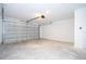 Garage with cement floors and white walls at 41975 Aspen St, Eustis, FL 32736