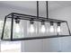 Modern light fixture featuring five bulbs in clear glass at 41975 Aspen St, Eustis, FL 32736