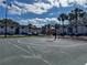 A fenced on-site basketball court provides a space for sports and recreation at 4405 S Semoran Blvd # 7, Orlando, FL 32822