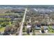 An aerial view of the house showing the neighborhood and its location at 4898 Meadow Dr, St Cloud, FL 34772