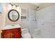 Bathroom featuring a shower, toilet, sink, and vanity at 4898 Meadow Dr, St Cloud, FL 34772