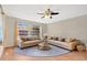 Inviting living room featuring two couches and a large window at 4898 Meadow Dr, St Cloud, FL 34772
