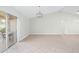 Bright living room featuring tile flooring and a sliding door to a patio at 517 Seville Ave, Altamonte Springs, FL 32714